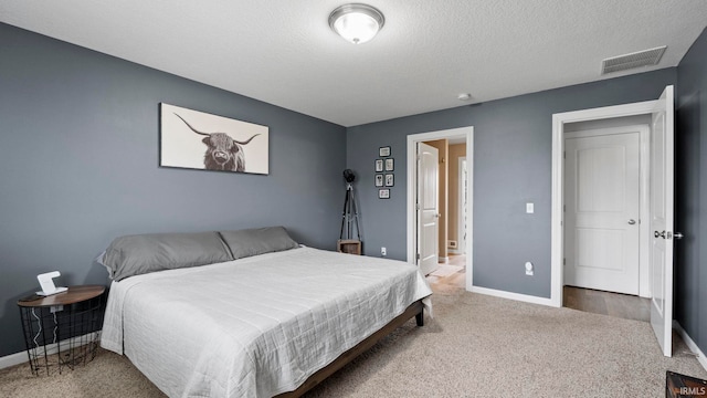 12946 Magnolia Creek Trl, Fort Wayne, IN 46814 - bedroom with baseboards, carpet floors, and a textured ceiling