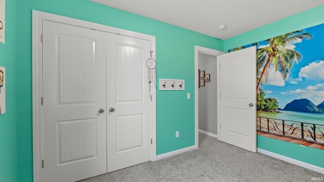 12946 Magnolia Creek Trl, Fort Wayne, IN 46814 - bedroom with carpet, a closet, and baseboards