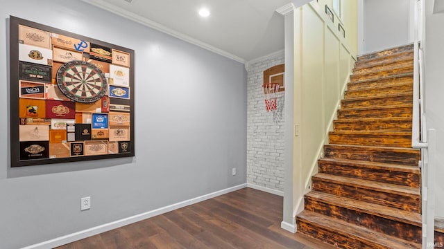 12946 Magnolia Creek Trl, Fort Wayne, IN 46814 - stairs with crown molding, wood finished floors, baseboards, and brick wall