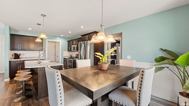 12946 Magnolia Creek Trl, Fort Wayne, IN 46814 - dining area featuring dark wood-type flooring and recessed lighting
