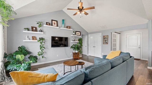 12946 Magnolia Creek Trl, Fort Wayne, IN 46814 - living area featuring ceiling fan, wood finished floors, high vaulted ceiling, and baseboards
