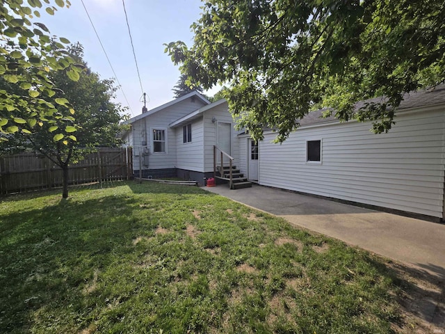 135 S 27th St, Lafayette, IN 47904 - rear view of property featuring entry steps and a patio