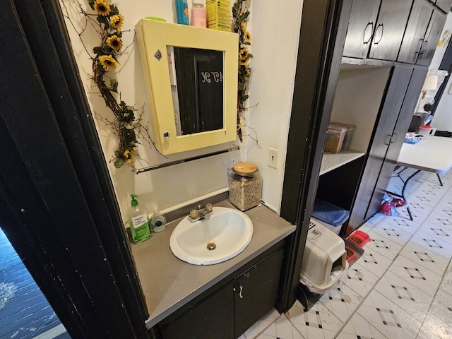 209 Seminary St, Vincennes, IN 47591 - bathroom with vanity and tile patterned floors