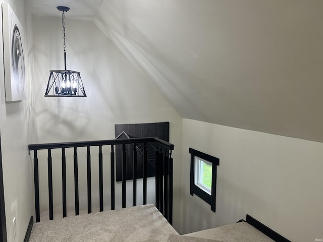 1302 Linden Ave, South Bend, IN 46628 - stairway featuring vaulted ceiling and a chandelier