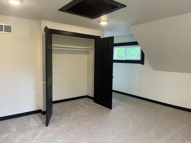 1302 Linden Ave, South Bend, IN 46628 - unfurnished bedroom with light carpet, baseboards, and a closet