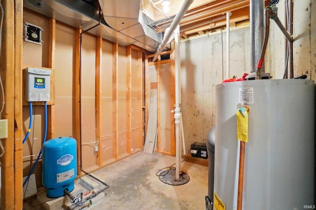 6011 W Wallen Rd, Fort Wayne, IN 46818 - unfinished below grade area with gas water heater and a water pressure tank