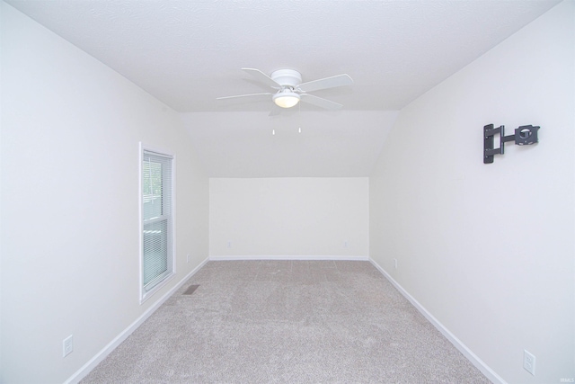 9031 Mill St, Stockwell, IN 47983 - bonus room featuring lofted ceiling, a ceiling fan, light carpet, and baseboards