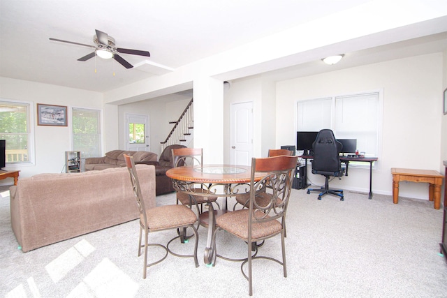 9031 Mill St, Stockwell, IN 47983 - dining space with stairway, an office area, light carpet, ceiling fan, and baseboards