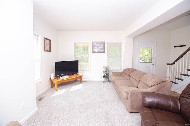 9031 Mill St, Stockwell, IN 47983 - carpeted living area featuring stairs and baseboards