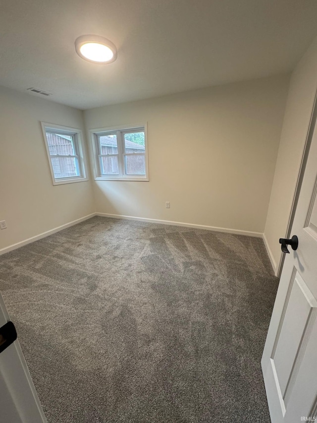 701 Ravine Park Blvd, Attica, IN 47918 - carpeted spare room featuring baseboards