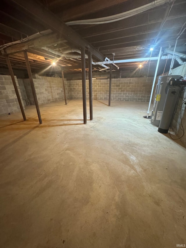 701 Ravine Park Blvd, Attica, IN 47918 - unfinished below grade area featuring water heater