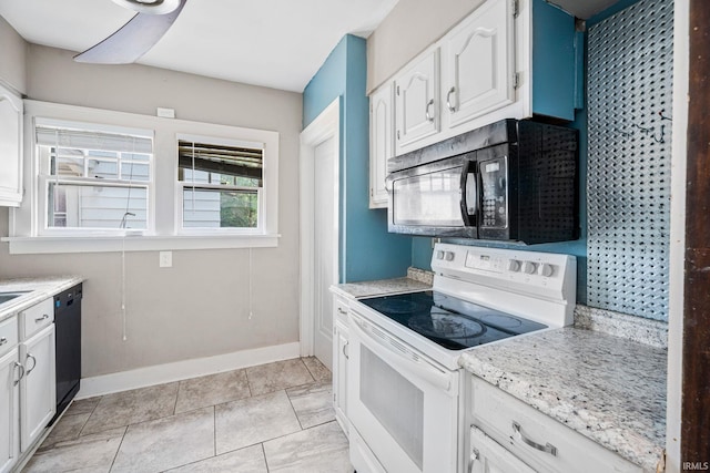 2217 Inglewood Pl, South Bend, IN 46616 - kitchen featuring black appliances, white cabinetry, and baseboards
