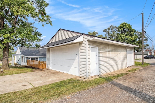200 Johnson St, Elkhart, IN 46516 - detached garage featuring driveway
