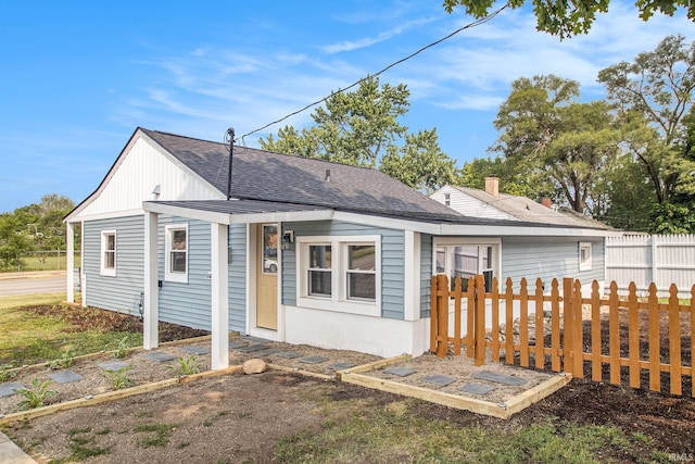 200 Johnson St, Elkhart, IN 46516 - rear view of property featuring roof with shingles
