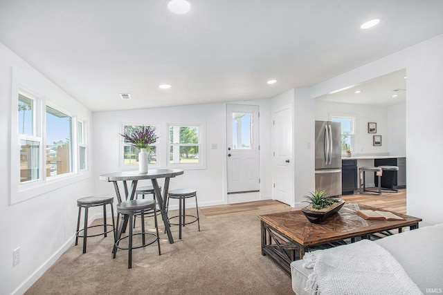200 Johnson St, Elkhart, IN 46516 - living area with plenty of natural light, baseboards, recessed lighting, and light wood-style flooring