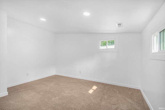 200 Johnson St, Elkhart, IN 46516 - carpeted empty room with baseboards and recessed lighting