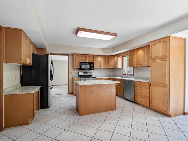 509 Water Meade Pl, Fort Wayne, IN 46825 - kitchen featuring appliances with stainless steel finishes, light countertops, a center island, light tile patterned floors, and brown cabinets