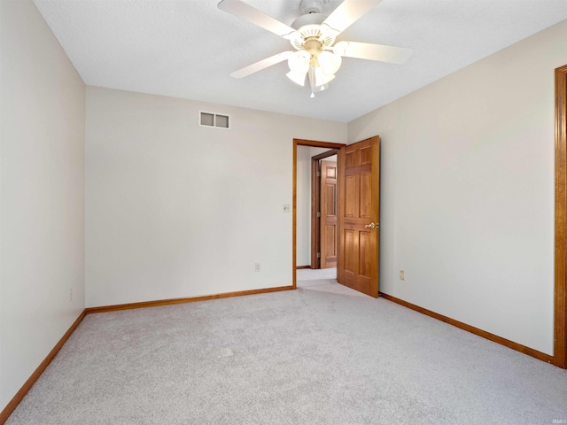509 Water Meade Pl, Fort Wayne, IN 46825 - unfurnished room with light carpet, baseboards, and ceiling fan