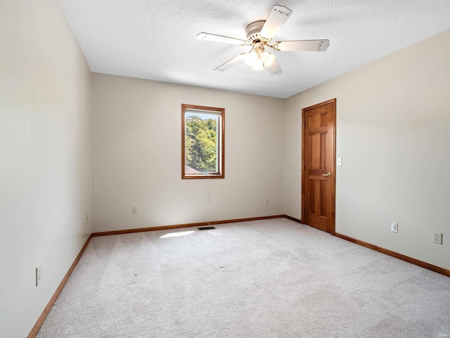 509 Water Meade Pl, Fort Wayne, IN 46825 - carpeted spare room featuring baseboards, ceiling fan, and a textured ceiling