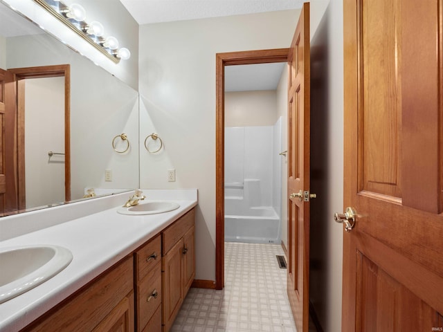509 Water Meade Pl, Fort Wayne, IN 46825 - bathroom with tile patterned floors, double vanity, and baseboards