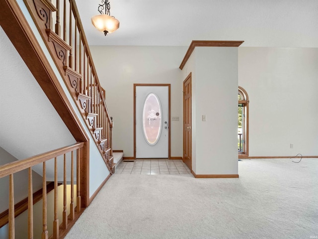 509 Water Meade Pl, Fort Wayne, IN 46825 - foyer featuring light colored carpet, stairs, and baseboards