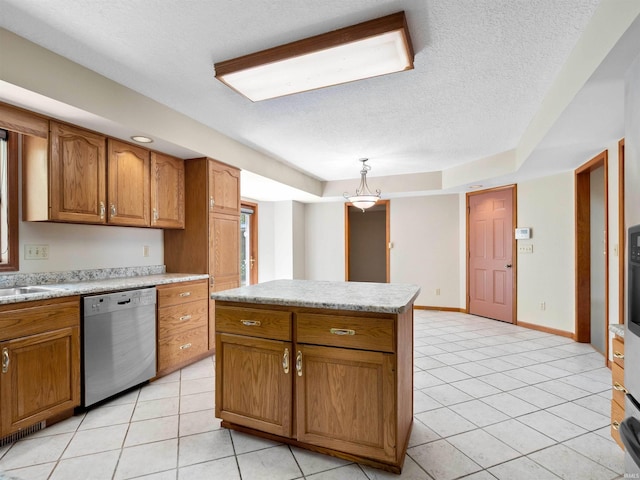 509 Water Meade Pl, Fort Wayne, IN 46825 - kitchen with dishwasher, brown cabinets, light countertops, a textured ceiling, and light tile patterned floors