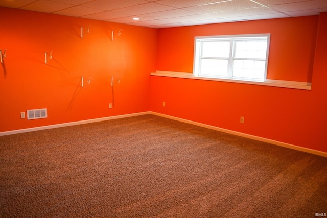 7458 E Lincolnway Rd, Columbia City, IN 46725 - carpeted spare room featuring baseboards and a paneled ceiling