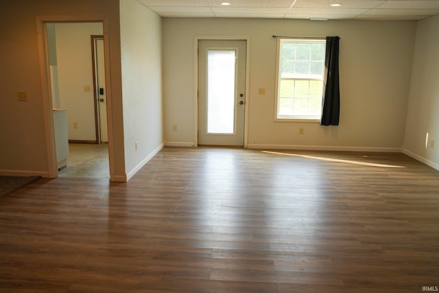 7458 E Lincolnway Rd, Columbia City, IN 46725 - empty room with a drop ceiling, baseboards, dark wood-style flooring, and recessed lighting