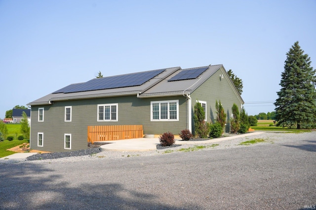 7458 E Lincolnway Rd, Columbia City, IN 46725 - view of property exterior featuring solar panels