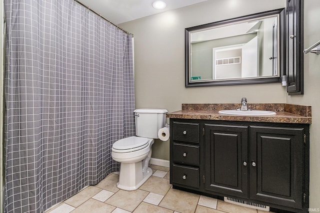 1708 Canterbury Dr, Elkhart, IN 46514 - bathroom featuring tile patterned flooring, vanity, toilet, and a shower with shower curtain