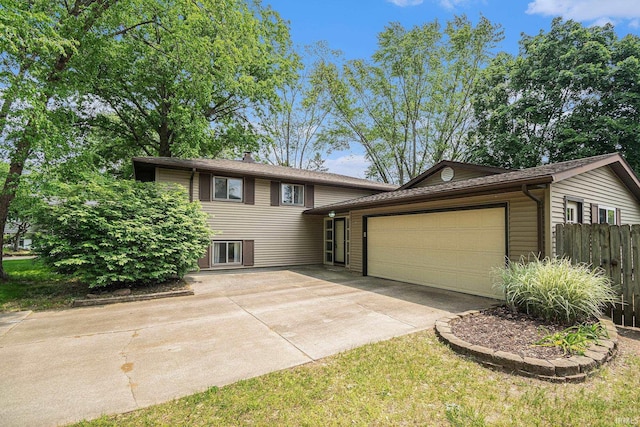 1708 Canterbury Dr, Elkhart, IN 46514 - split level home with a garage and concrete driveway