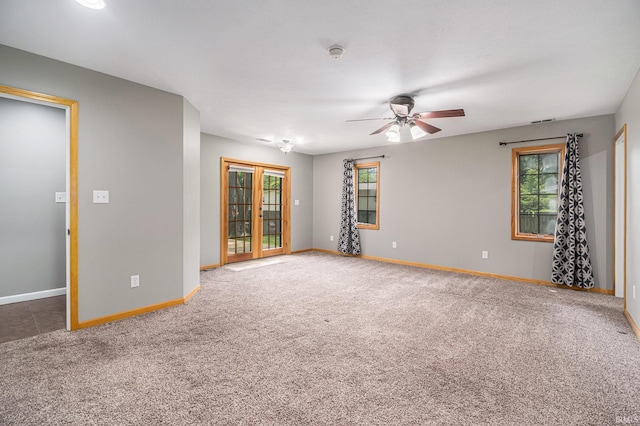 1708 Canterbury Dr, Elkhart, IN 46514 - carpeted spare room featuring ceiling fan, baseboards, and a smoke detector