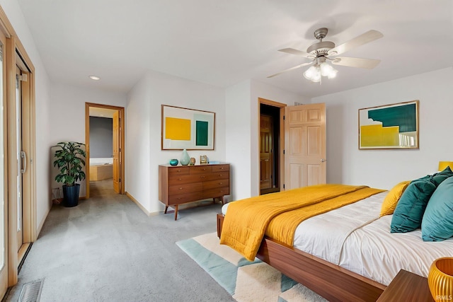 9529 Skipjack Cv, Fort Wayne, IN 46835 - bedroom featuring light colored carpet, baseboards, recessed lighting, a ceiling fan, and ensuite bath