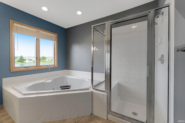9529 Skipjack Cv, Fort Wayne, IN 46835 - full bathroom featuring a shower stall, a whirlpool tub, wood finished floors, and recessed lighting