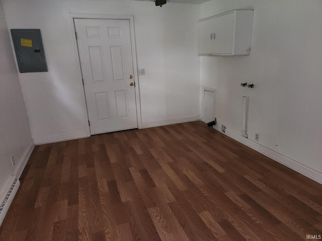 706 S Western Ave, Marion, IN 46952 - laundry room with baseboard heating, electric panel, wood finished floors, baseboards, and washer hookup