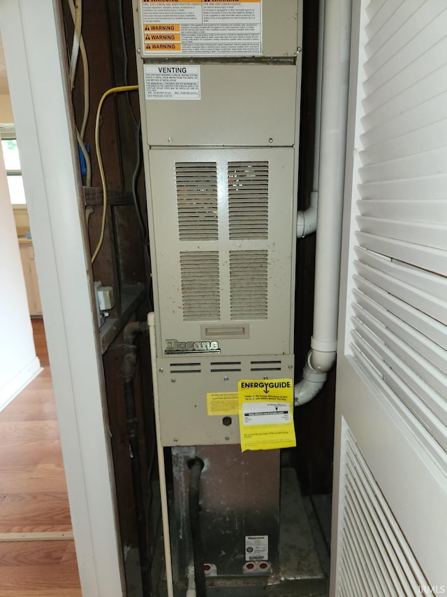 706 S Western Ave, Marion, IN 46952 - utility room featuring heating unit