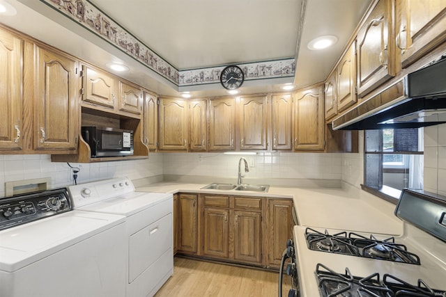 1209 E Water St, Mount Vernon, IN 47620 - laundry area with washing machine and dryer, light wood-style floors, and recessed lighting