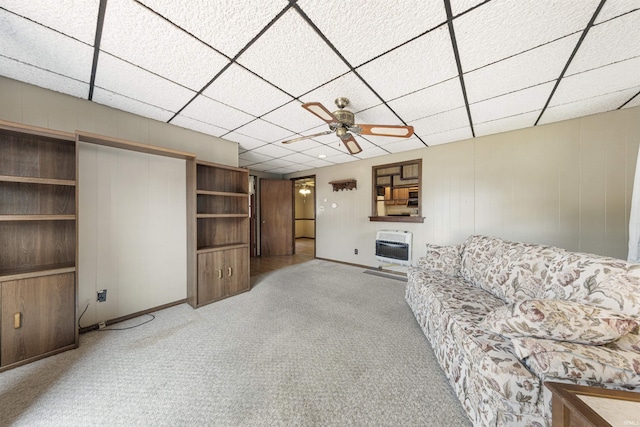 1209 E Water St, Mount Vernon, IN 47620 - living room featuring light carpet, heating unit, a ceiling fan, and baseboards