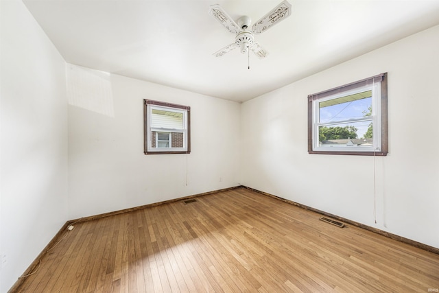 1209 E Water St, Mount Vernon, IN 47620 - empty room featuring ceiling fan, light wood-style flooring, and baseboards
