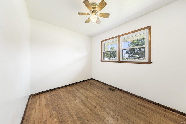 1209 E Water St, Mount Vernon, IN 47620 - unfurnished room with hardwood / wood-style flooring, baseboards, and ceiling fan