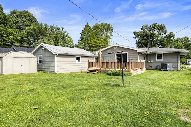1209 E Water St, Mount Vernon, IN 47620 - rear view of property featuring a wooden deck, a lawn, and cooling unit