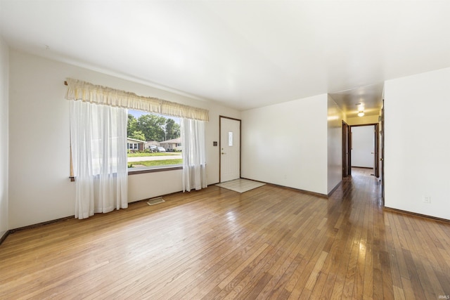 1209 E Water St, Mount Vernon, IN 47620 - unfurnished room featuring wood-type flooring and baseboards