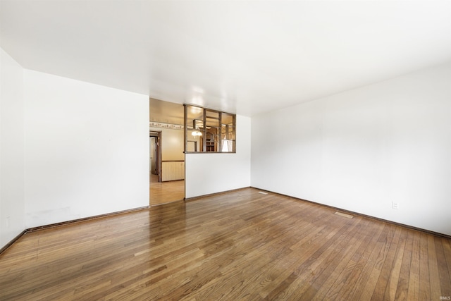 1209 E Water St, Mount Vernon, IN 47620 - unfurnished room with hardwood / wood-style floors and baseboards