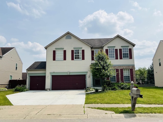 9987 Rainbow Falls Ln, Fishers, IN 46037 - traditional home featuring a front yard, concrete driveway, a garage, an attached garage, and a shingled roof