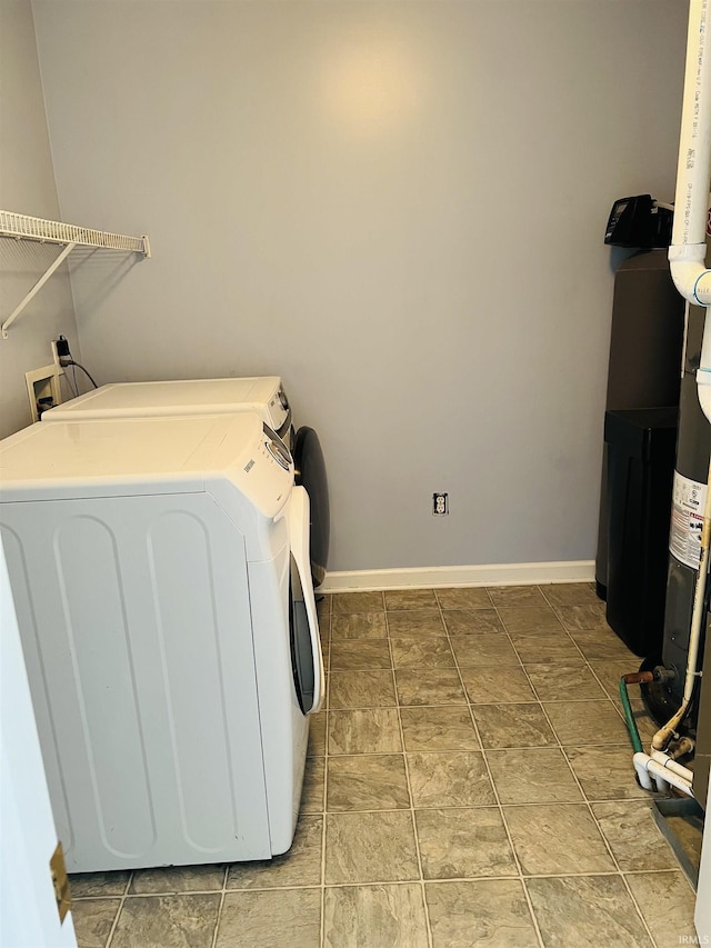 9987 Rainbow Falls Ln, Fishers, IN 46037 - laundry room featuring washer and dryer and baseboards