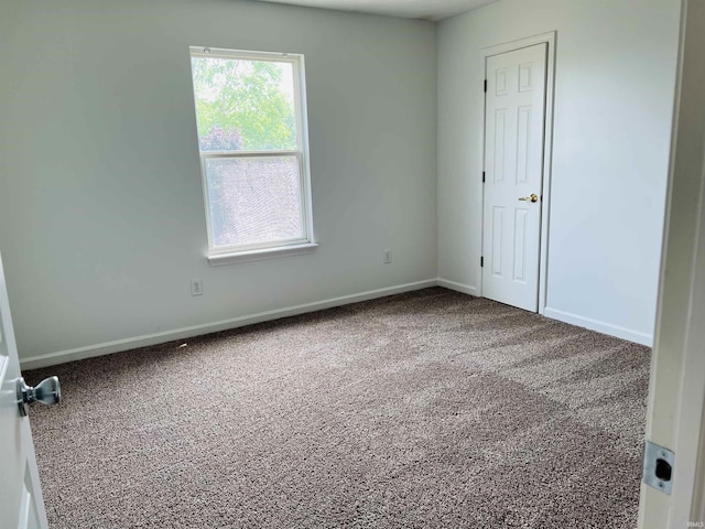 9987 Rainbow Falls Ln, Fishers, IN 46037 - carpeted spare room featuring baseboards