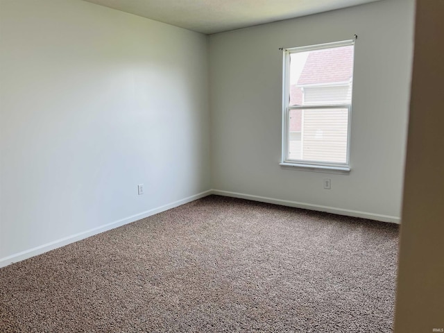 9987 Rainbow Falls Ln, Fishers, IN 46037 - empty room featuring carpet flooring, healthy amount of natural light, and baseboards