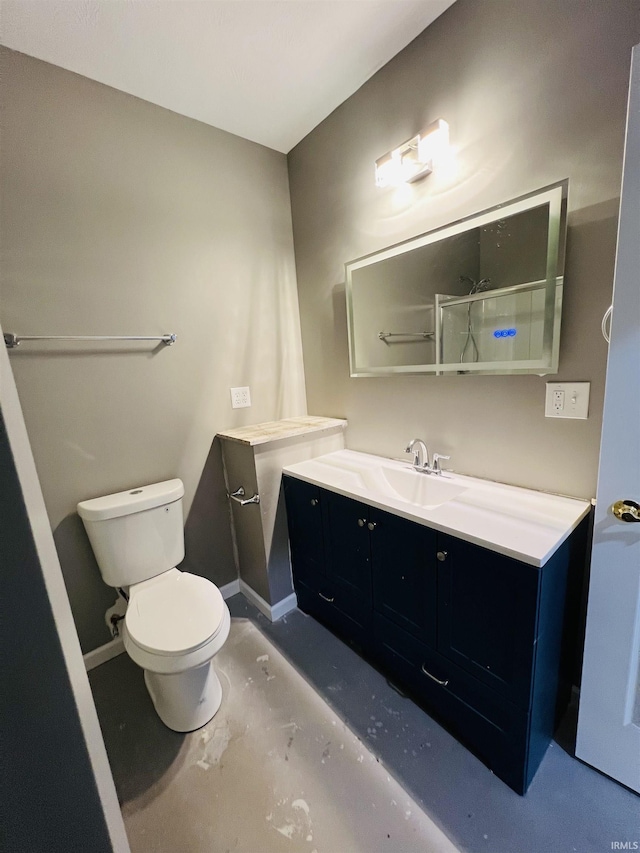 9987 Rainbow Falls Ln, Fishers, IN 46037 - bathroom featuring toilet, vanity, and baseboards