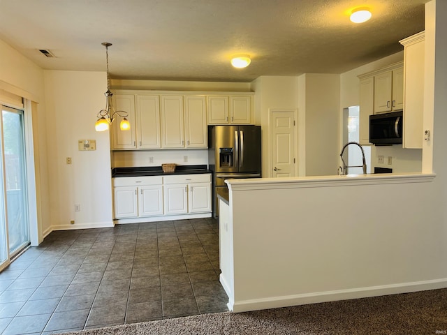 9987 Rainbow Falls Ln, Fishers, IN 46037 - kitchen featuring black microwave, stainless steel refrigerator with ice dispenser, a peninsula, dark countertops, and baseboards