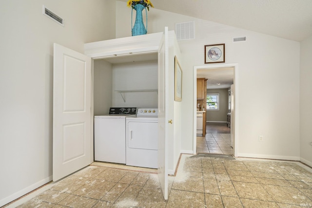 8056 E N Rd, Syracuse, IN 46567 - washroom featuring washing machine and clothes dryer and baseboards